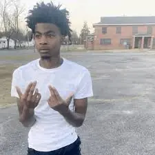 SYBAU meme with iconic shut up hand sign